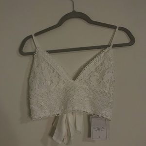 Super cute white Lacey crop top new with tags!!!
